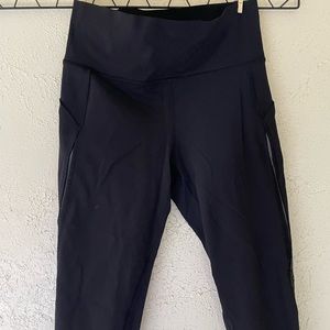 Lululemon cropped black leggings. Size 8.